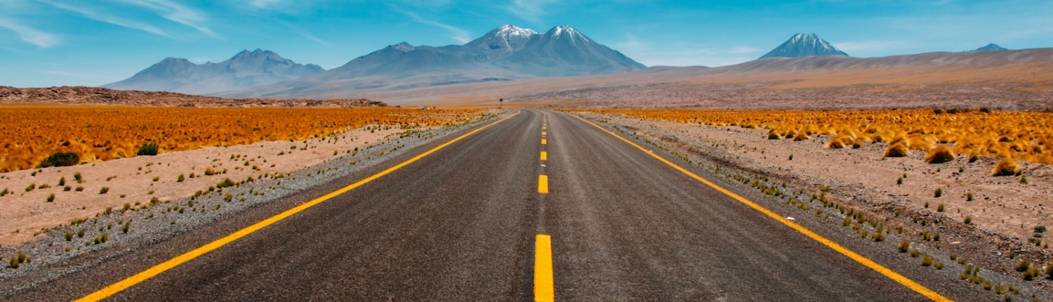 lone road going to mountains